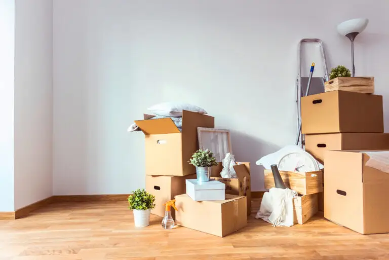 Photo of an interior room with packed boxes to be moved to new location.